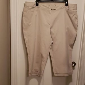 Tan capri pants w/ cutout trim on bottom of legs